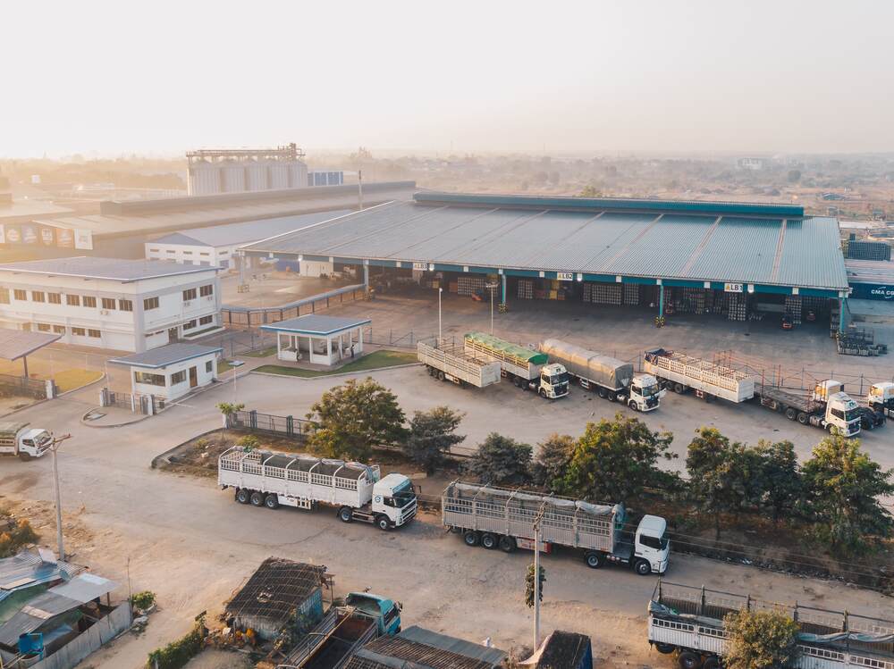aerial view factory trucks parked