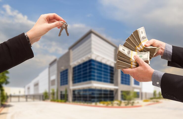 thousand dollars keys front new commercial building