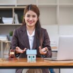 Real estate agent sitting on her desk