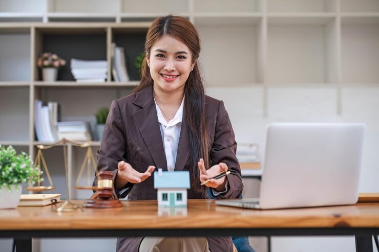 Real estate agent sitting on her desk