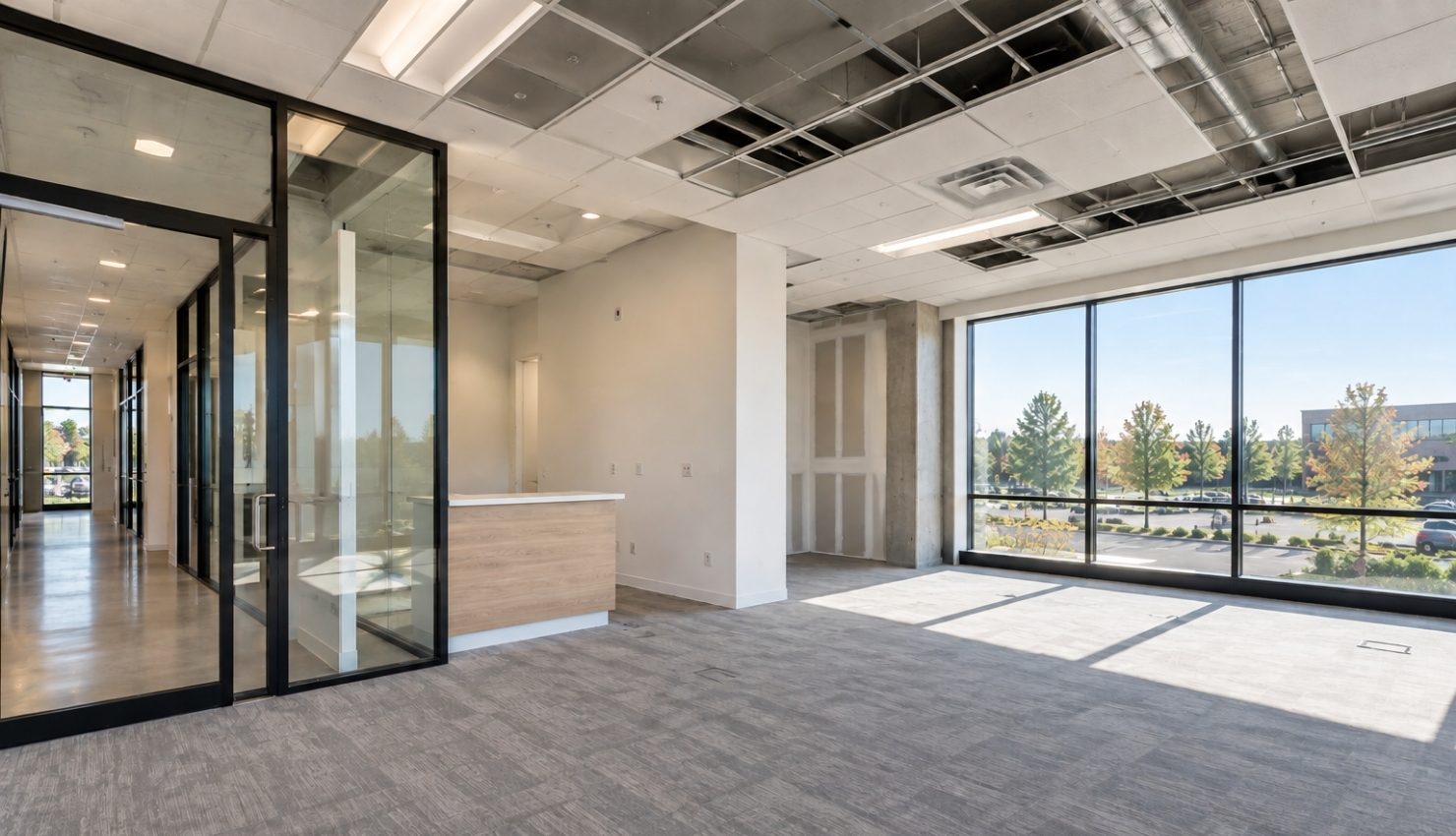 commercial office space with a glass-enclosed conference room