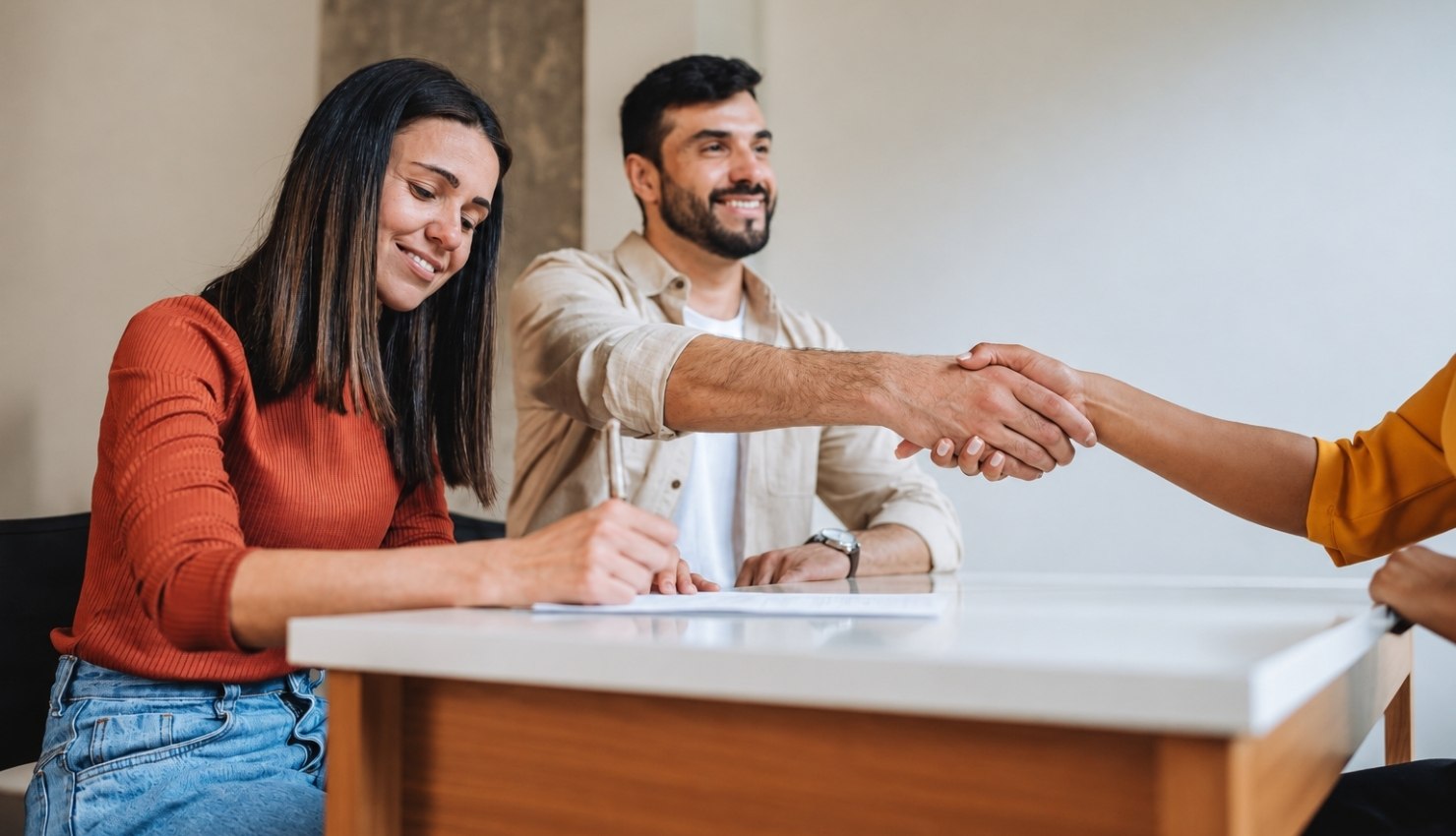 woman signs a document